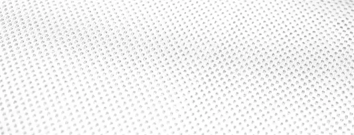 White breathable mesh texture representing airflow and lightweight comfort for daily wear