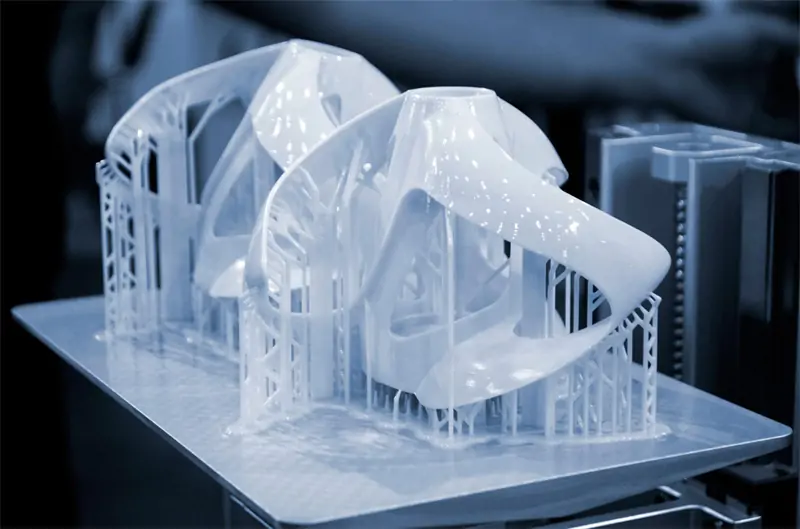 SLA 3D printed resin parts showing smooth photopolymer surface for custom cage design